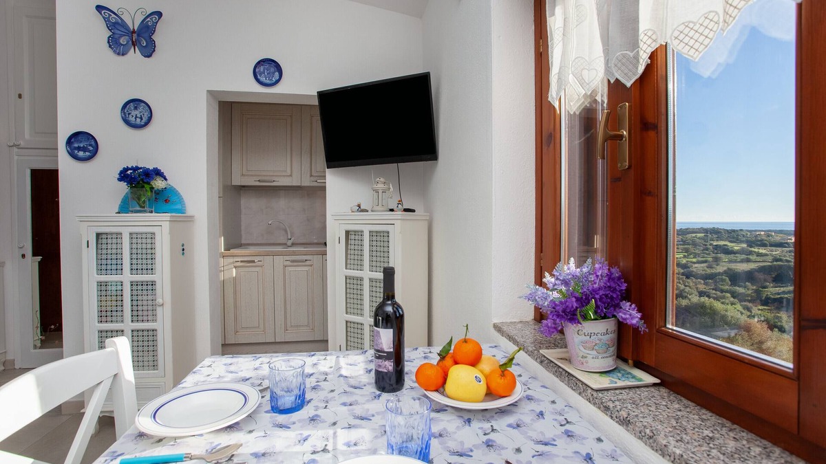 Agrustos Apartment | Apartment "La Finestra sul Mare" with Sea View, Private Terrace & Wi-Fi
