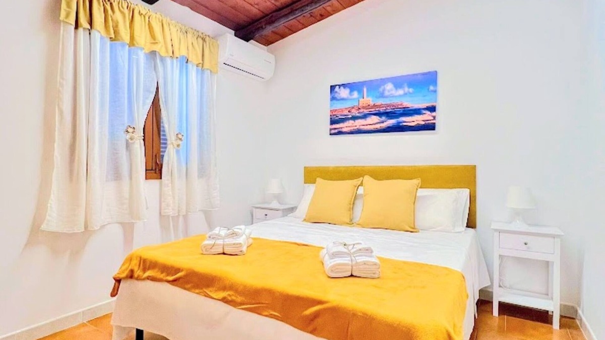 Montincello Apartment | Apartment 'La Mignola - Bilo 2 - Duplicate' with Shared Garden, Wi-Fi and Air Conditioning