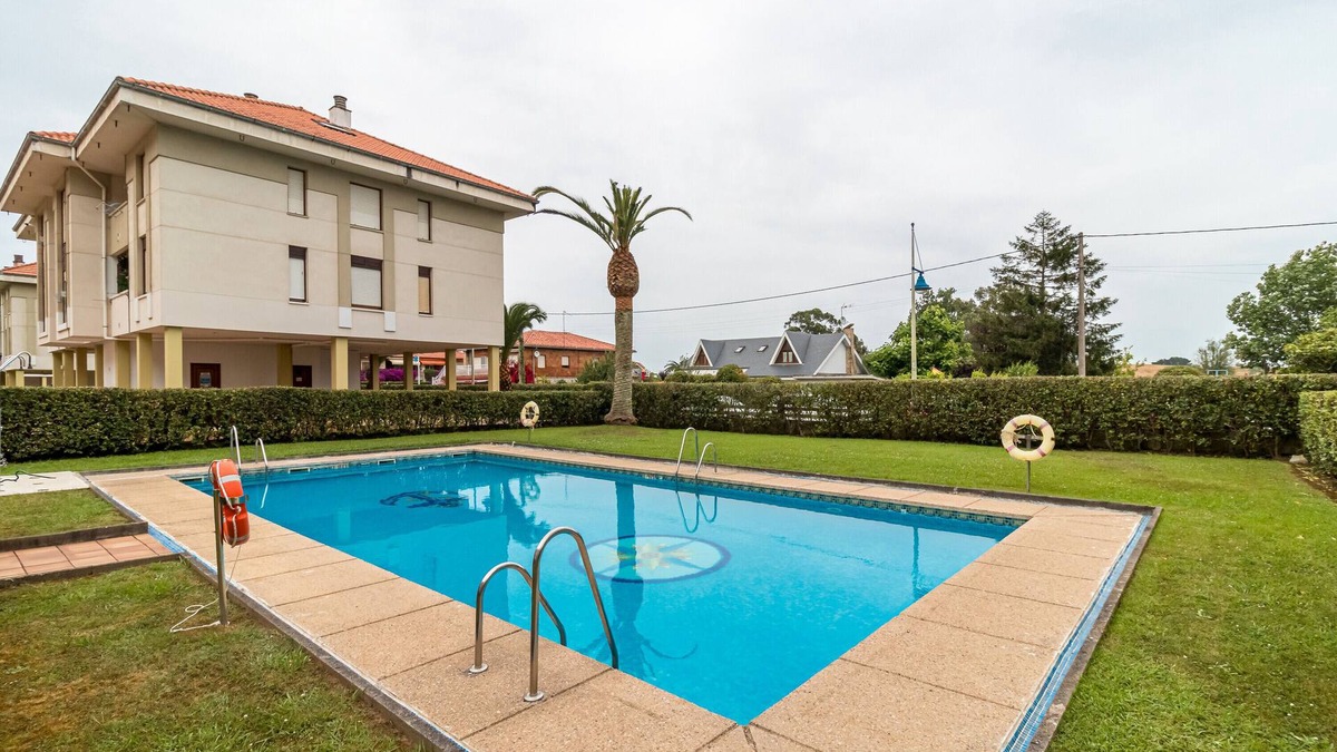Suances Apartment | Apartment 'La Ribera' with Mountain Views, Shared Pool and Wi-Fi