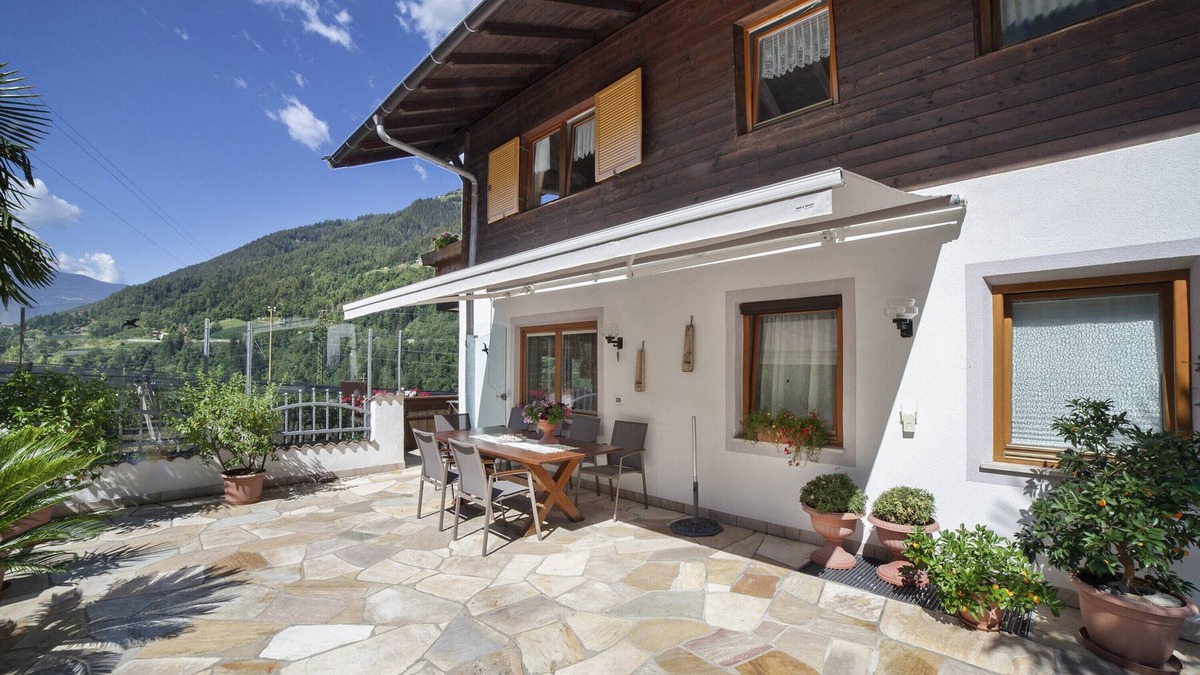 San Leonardo in Passiria Apartment | Apartment "Löwenzahn" with Mountain View, Pool, Wi-Fi, Balcony & Garden