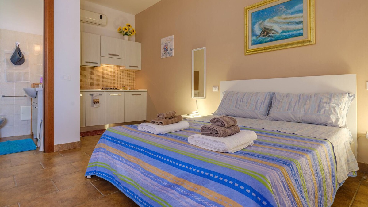 Borgagne Apartment | Apartment 'Mamba House 3' with Private Terrace, Shared Garden and Air Conditioning