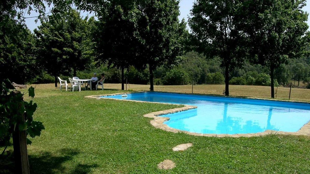 Santa Pau Apartment | Apartment 'Mas El Carrer - Verd' with Shared Pool, Shared Garden and Wi-Fi