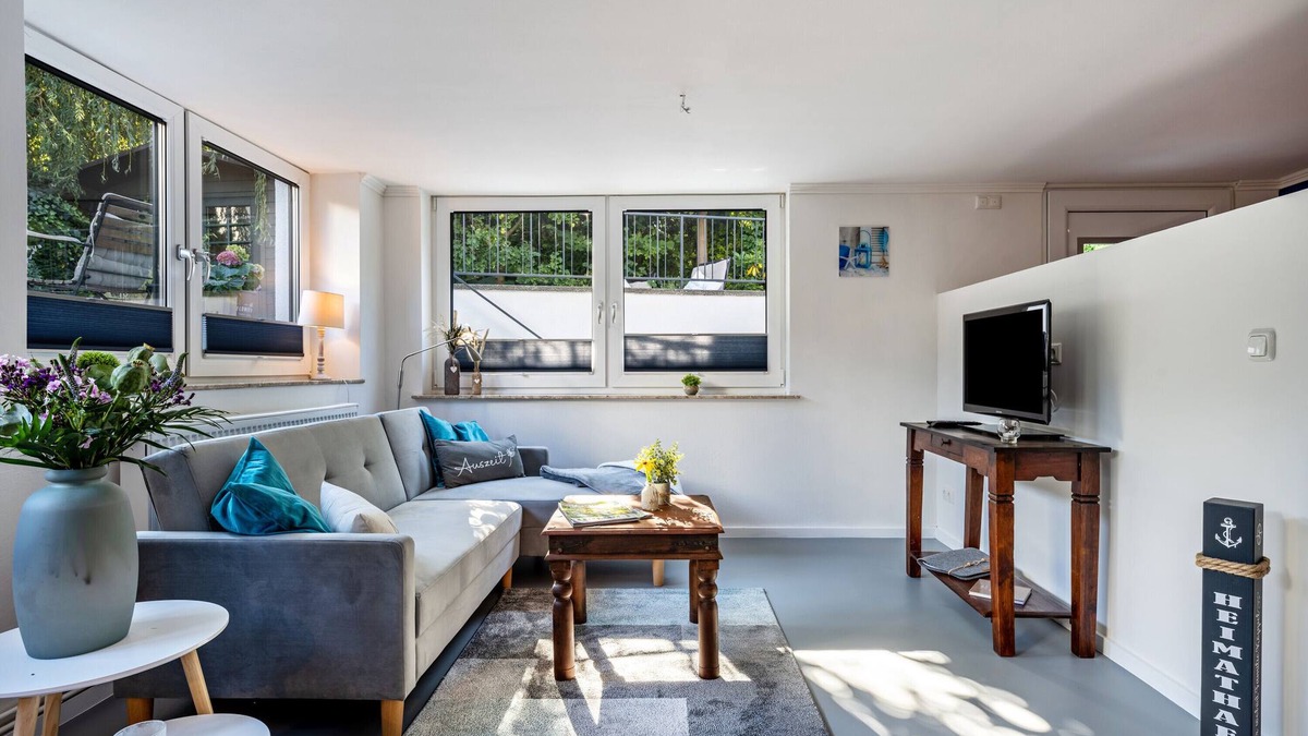 Brodten Apartment | Apartment 'Meerlust' with Private Terrace, Private Garden and Wi-Fi