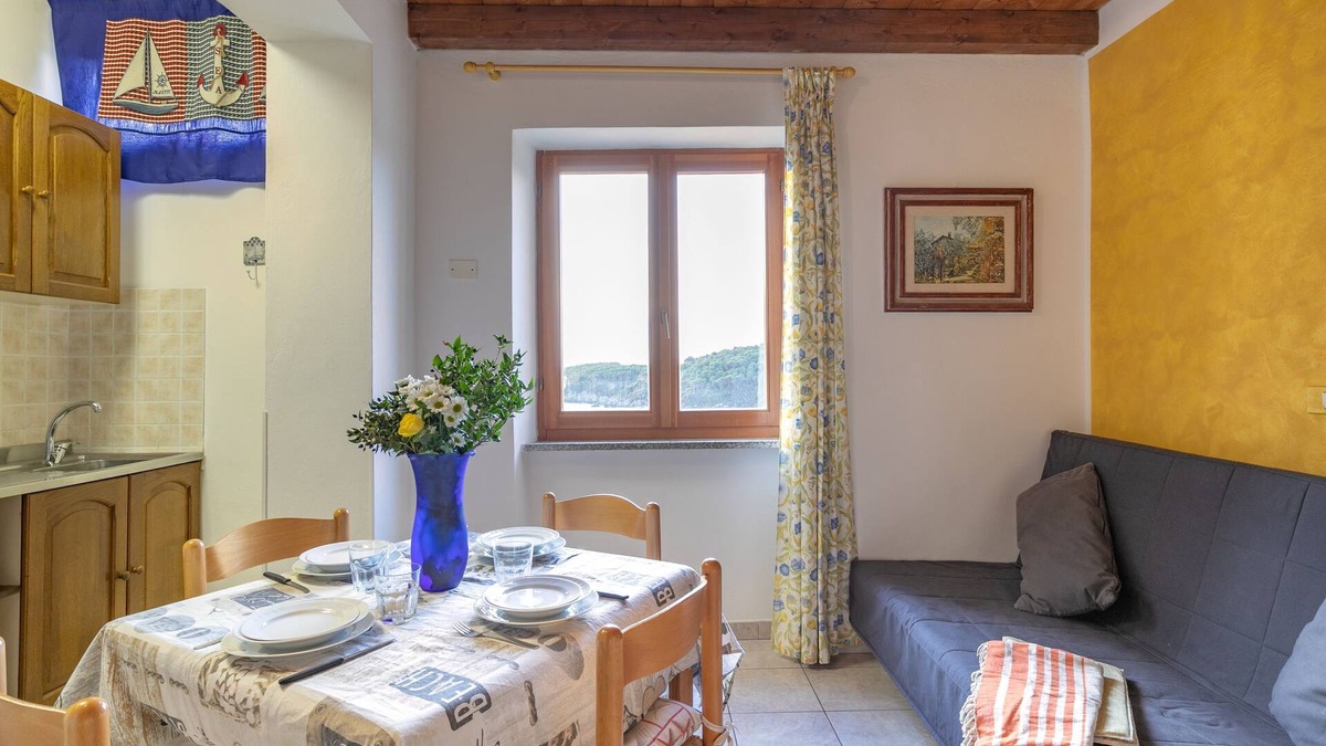 Fetovaia Apartment | Apartment "Simona Vista Mare" near the Beach with Terrace, Air Conditioning and Wi-Fi