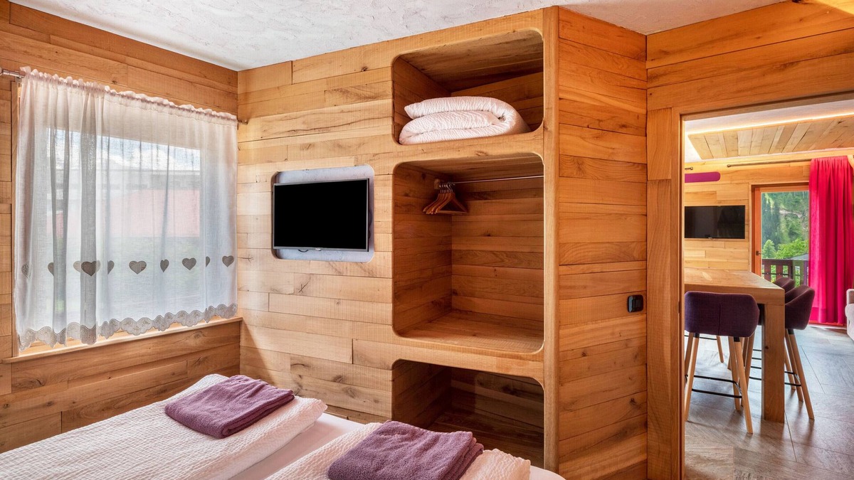 Pie Falcade Apartment | Apartment 'Tana Del Picchio Rosso' with Mountain View, Shared Garden and Wi-Fi