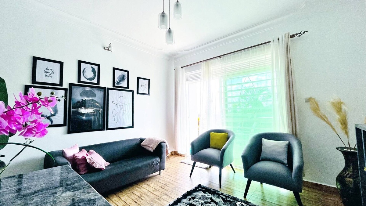 Kireka Apartment | Apartment unit - White House with rental car.