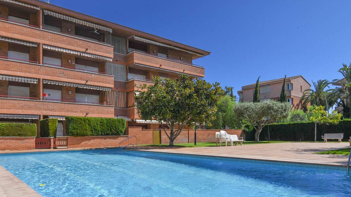 Comarruga Apartment | Apartment with terrace and communal pool