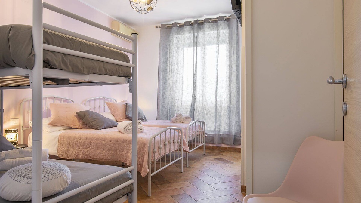 Quartiere XX Ardeatino Apartment | Apartment with three bedrooms and three bathrooms for families and groups of friends