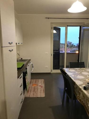 Sant'Ilario dello Ionio Apartment | Appartamento fronte spiaggia climatizzato