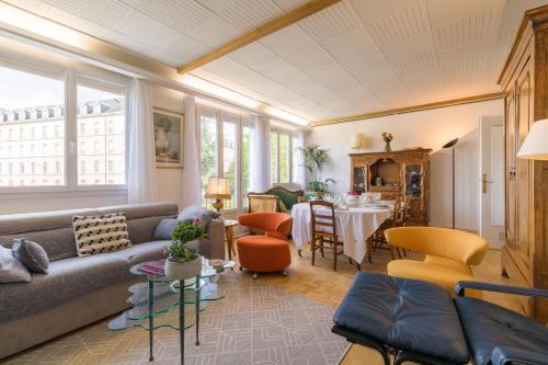Faubourg Sud Apartment | Appartement Climatisé 100M2 7mn Centre Ville Garage 5Pièces 5 Adultes Bébé Arrivée Autonome