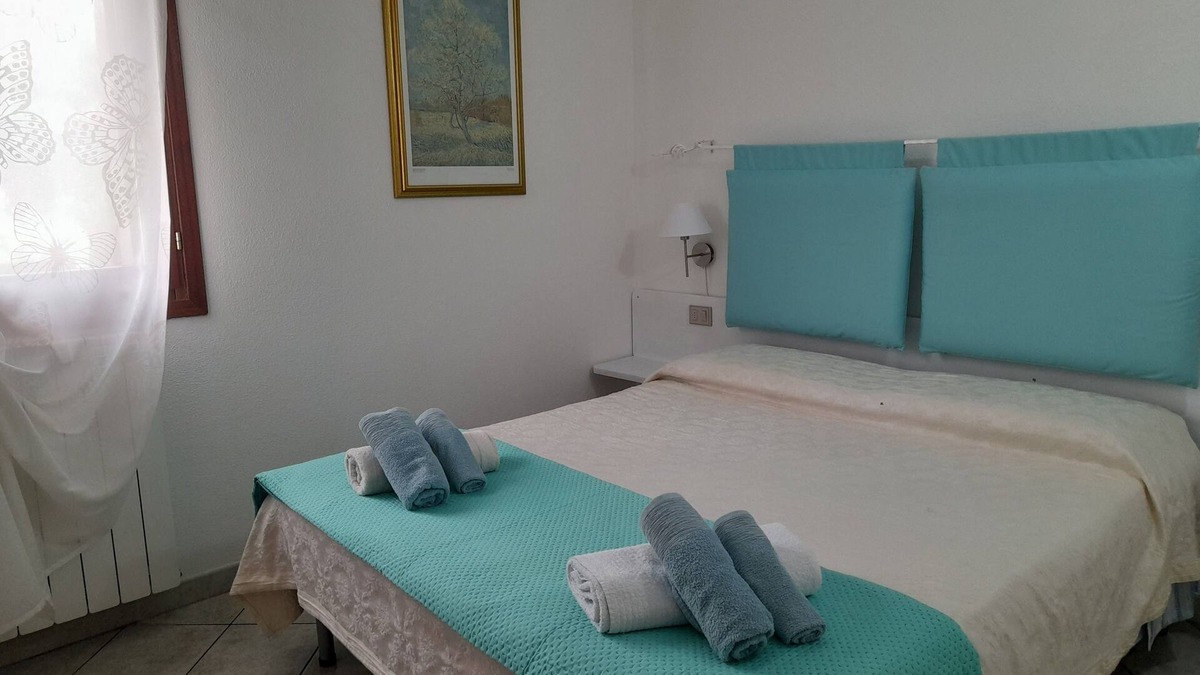 San Teodoro Apartment | Aquamarine villa with garden and wifi