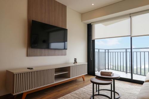 San Isidro Apartment | Aquilaria by Wynwood House