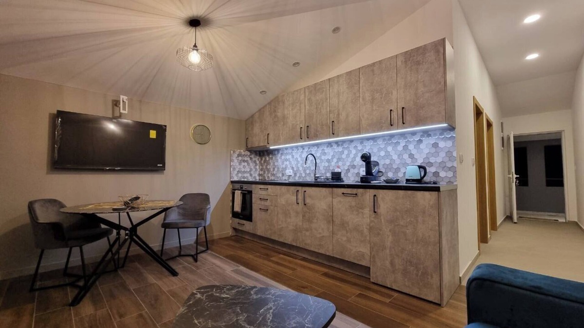 Golubovci Apartment | Art deco-inspired apartment in a quiet area near the Airport