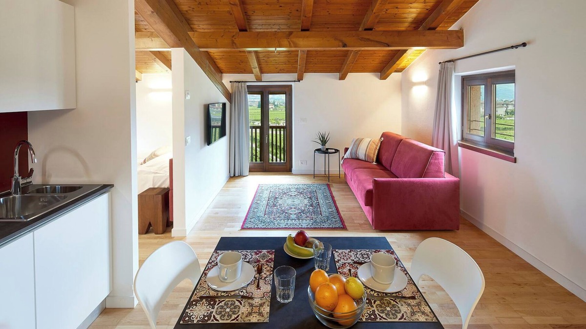 Riva del Garda Apartment | Attic Apartment "Papavero" with Balcony, Views to the Mountains and Wi-Fi