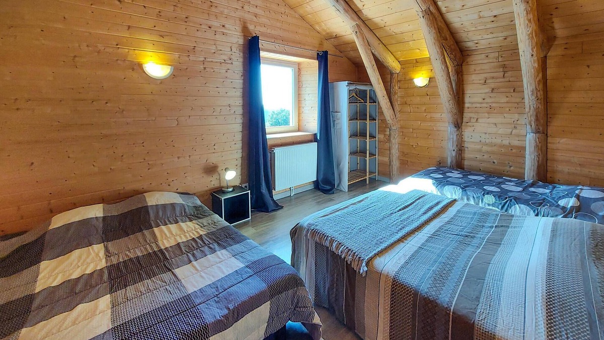 Vielprat House | Attractive vacation home made of wood and stone with space for the whole family.