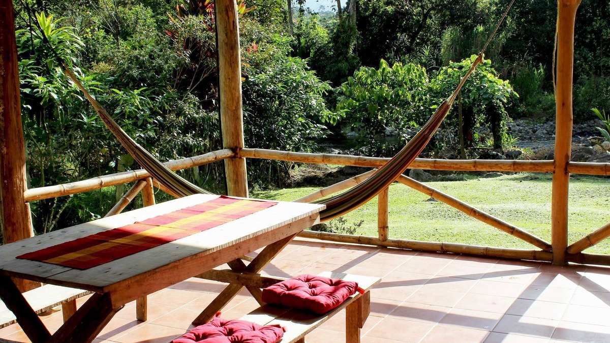 La Suiza Cottage | Authentic Vacation Home in Unique Setting of 25 Acres of Tropial River Landscap