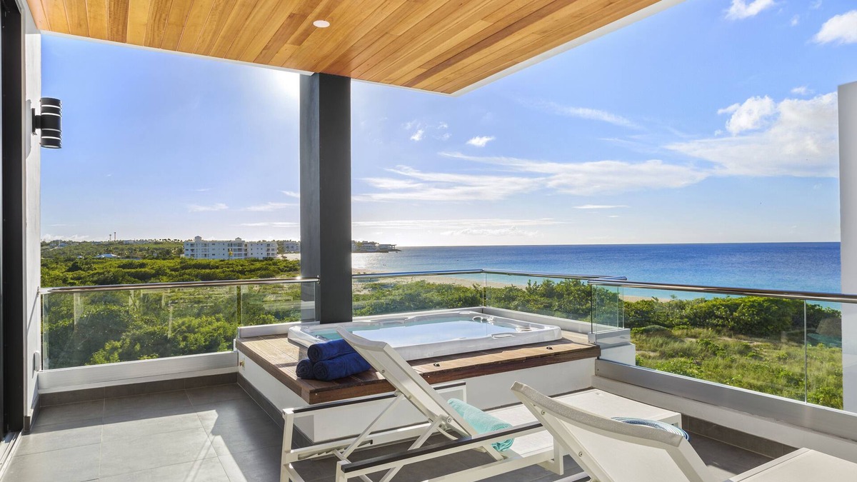 West End Village Villa | Award-winning Tranquility Beach Resort Oceanview Penthouse Villa on Meads Bay