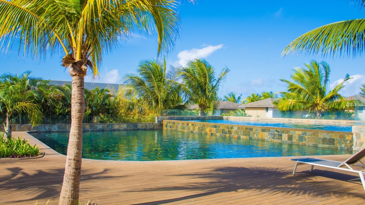 Roches Noires Hotel | Azuri Apartment with Beach, Pools, Gym, Restaurants, Spa, Boats, kids Corner