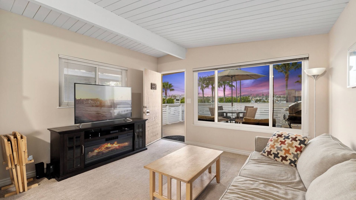 Balboa Peninsula Apartment | Backyard Beach! 50 Steps to the Sand with Bay Views and Ocean Blues