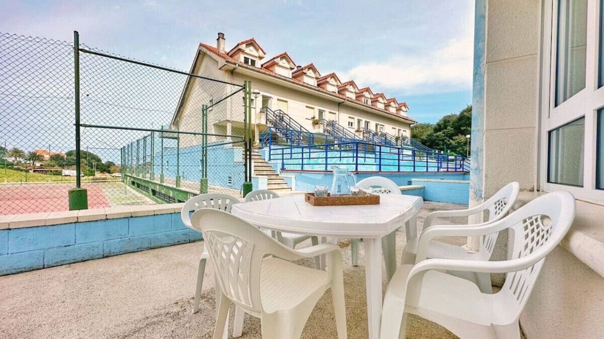 Isla Apartment | Bajo en la playa con piscina - La Arena 4203