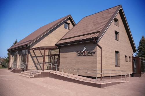 Gatauciai House | Baltas gandras