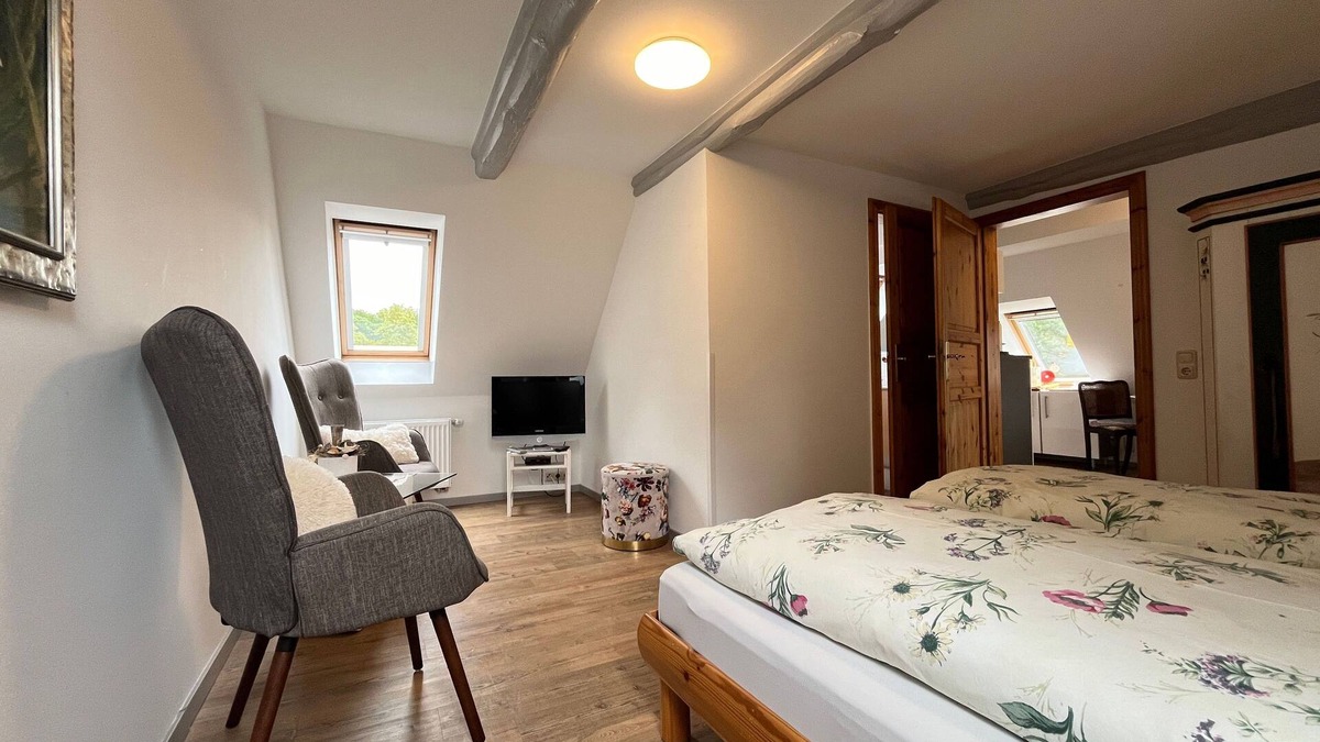Biendorf Apartment | Baltic Sea vacation apartment 1-left/maisonette/upper floor with balcony - FeWo's am Gutshaus