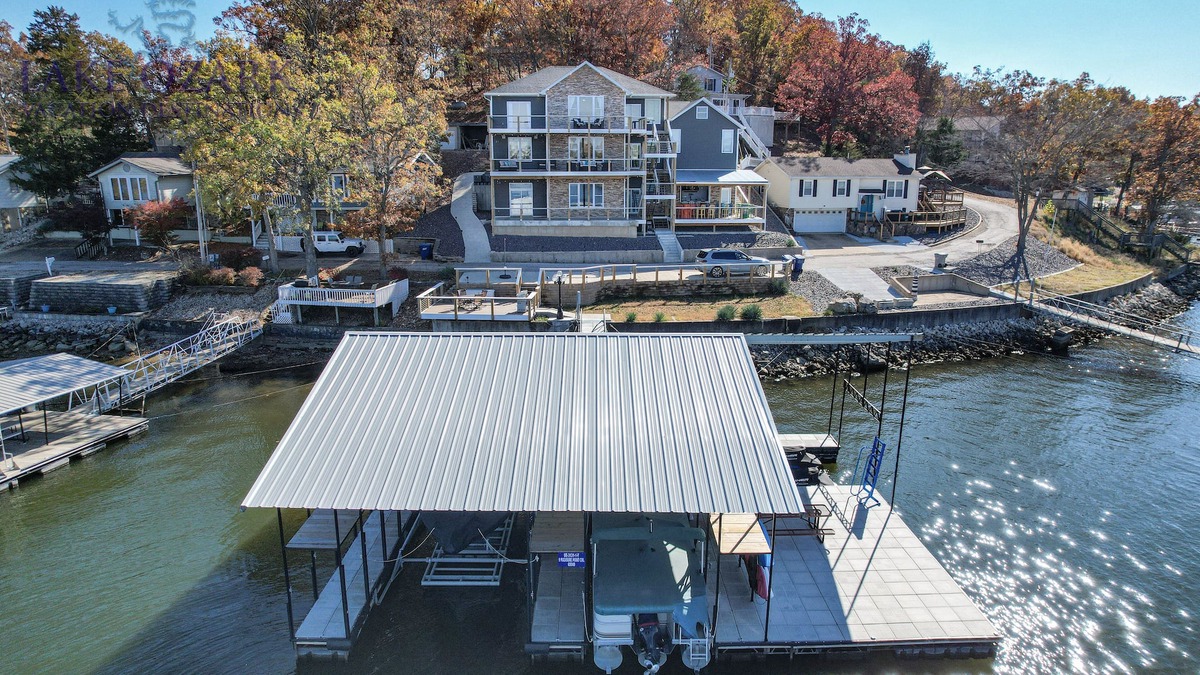 Lake Ozark House | BARE FEET RETREAT! Swim Dock, 5 Decks, Elevator, Gaming Room, Bagnell Dam Strip!