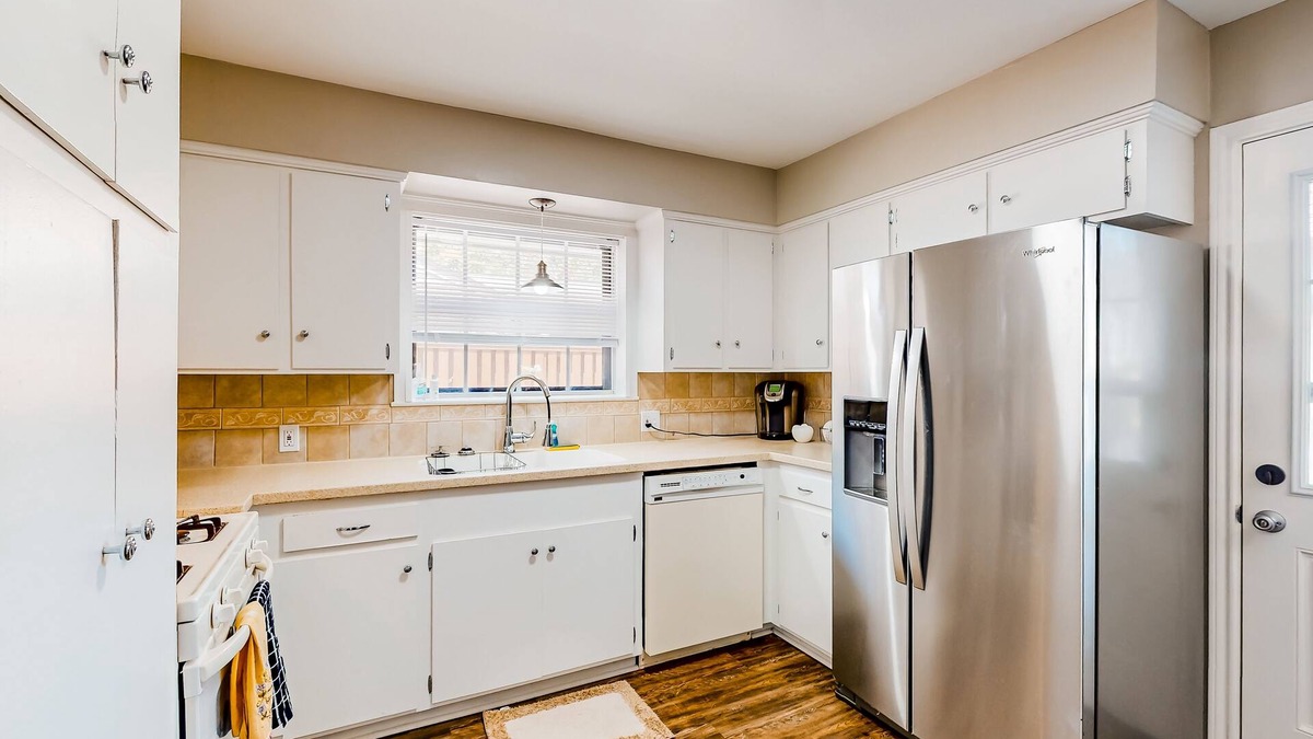 La Porte House | Bay Harbor Beauty | House in La Porte with yard and fireplace - close to beaches