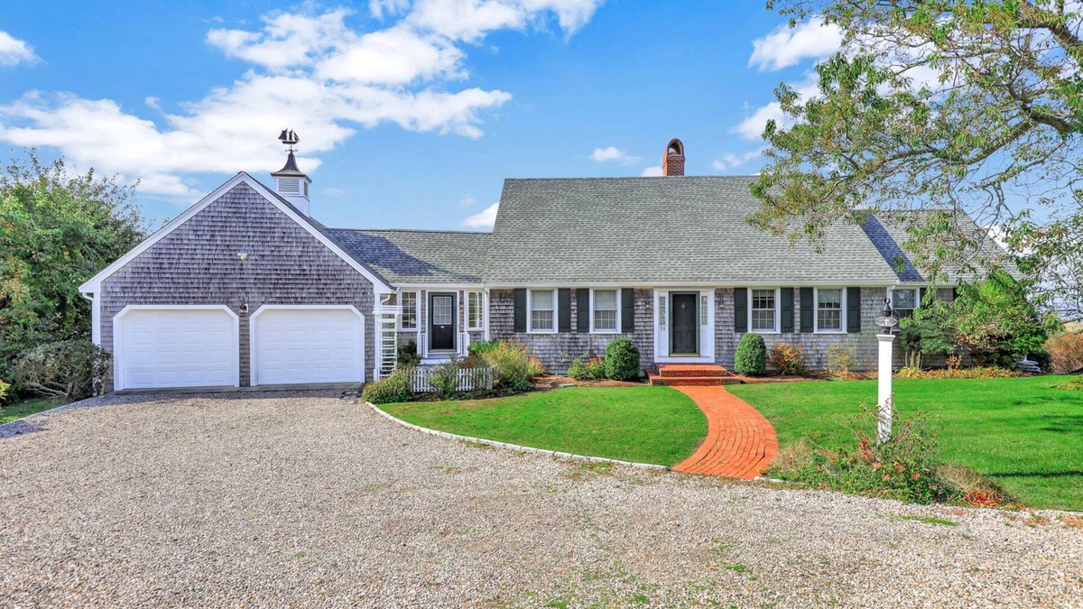 Dennis House | Bay Side with a shared private beach.