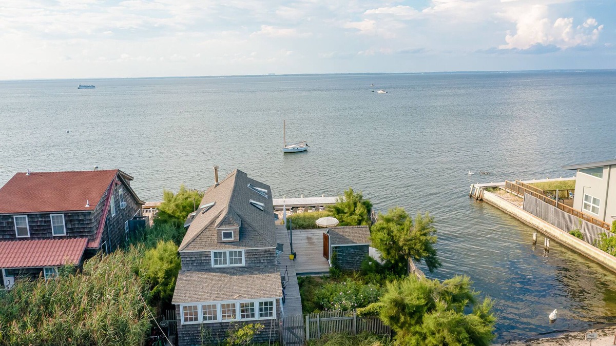 Ocean Bay Park Apartment | Bay-view apartment with deck, grill, enclosed porch, full kitchen, & WiFi
