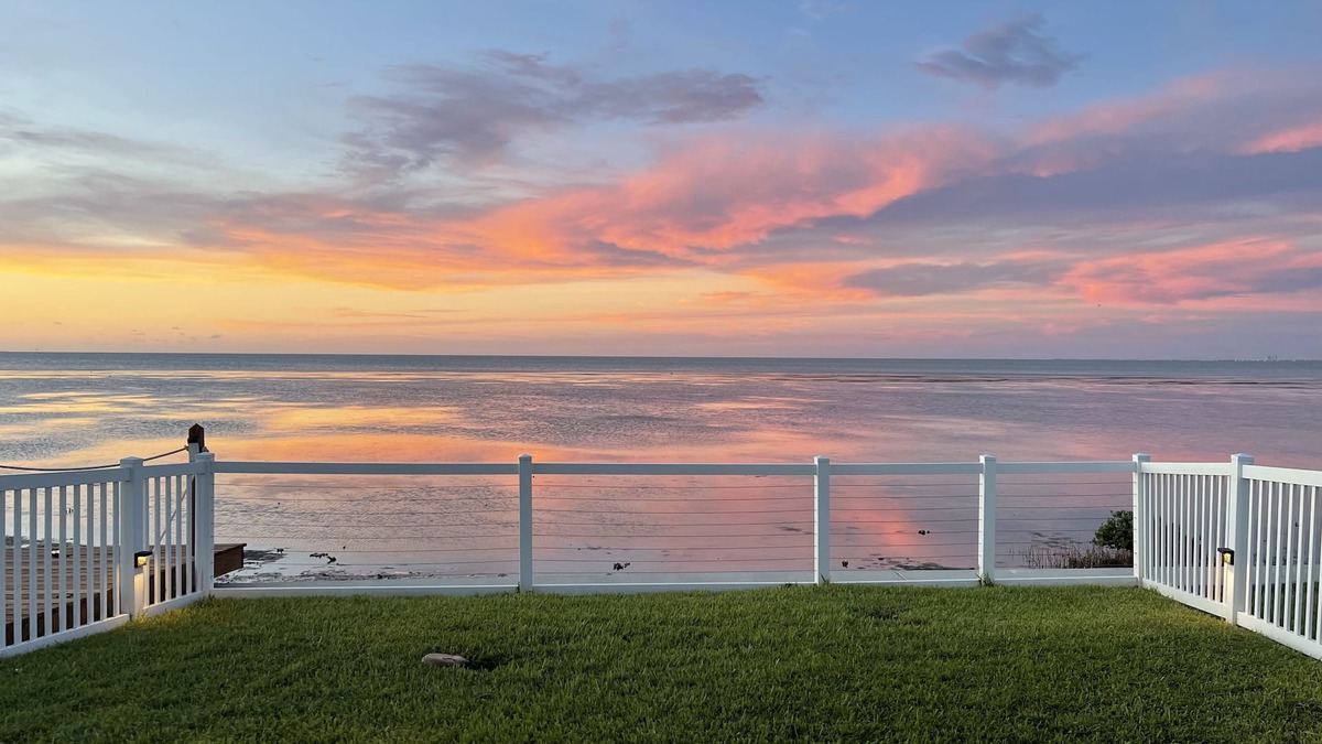 Port Isabel House | Bayfront Home ~close to beach~ Community pool~ hot tub ~ family friendly.