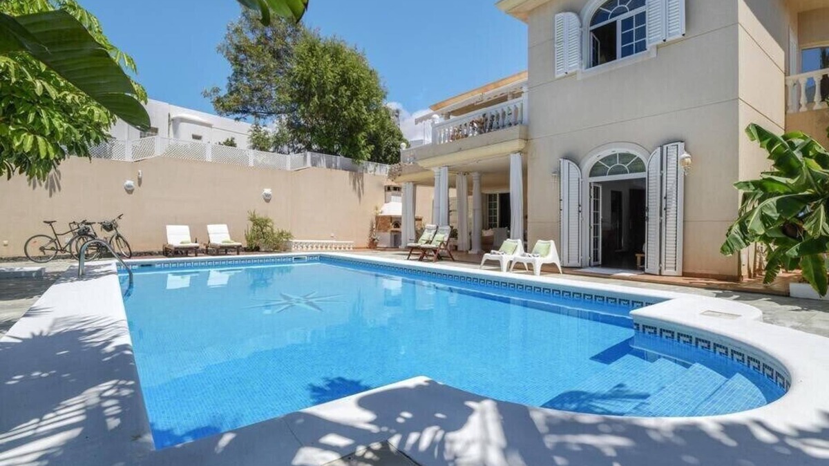 Playa del Cable Apartment | Bayside Concha House: Beachfront Oasis with Heated Pool