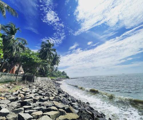 Elathur Villa | Baywatch by Grha - A Picturesque Beachfront Villa