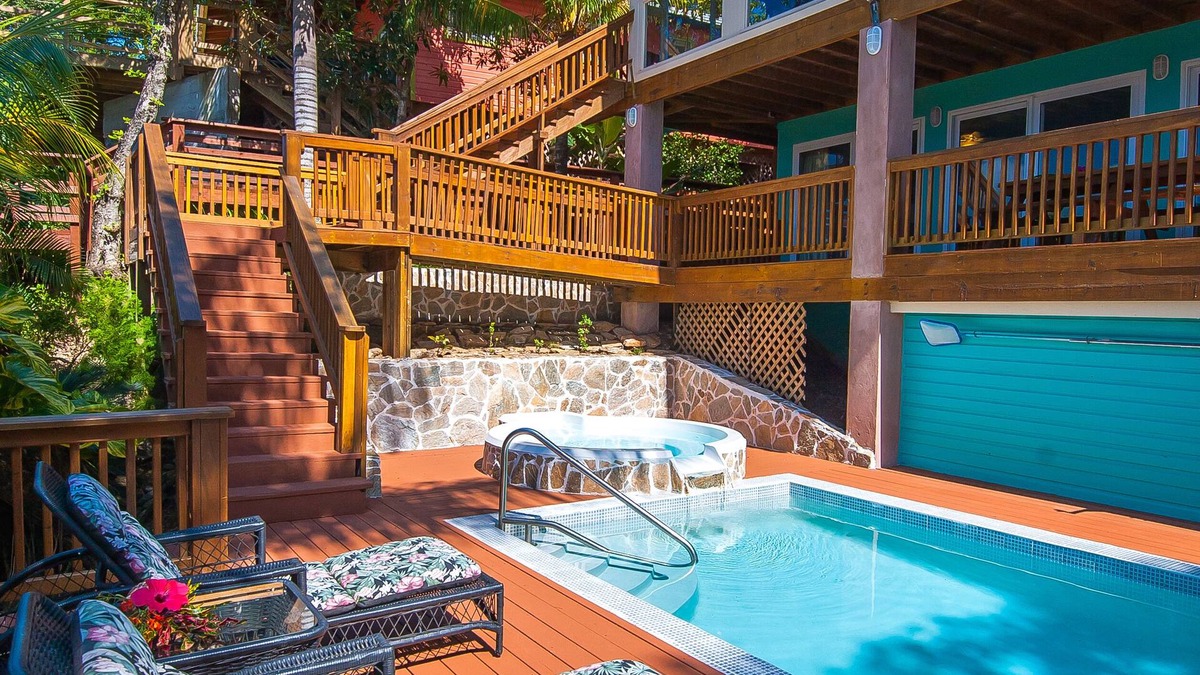 Orchid Beach Village House | BEACH front between W Bay & W End - POOL & DOCK - screen porch - Sunsets galore