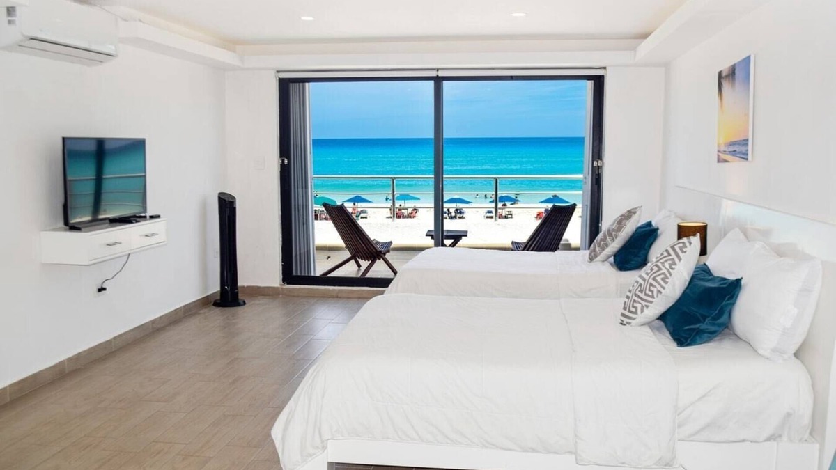 Punta Cancun Apartment | Beach front Villa, great location, steps from the beach!
