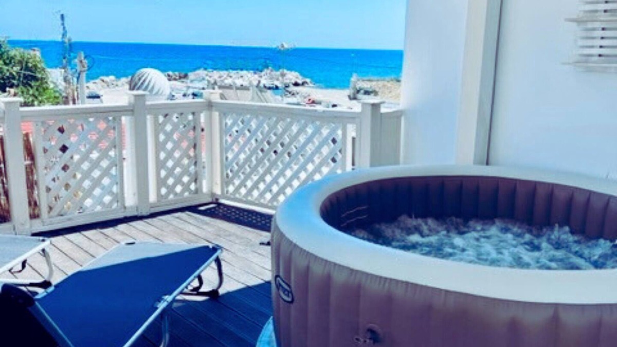 Stegna Villa | Beach front Villa with hot tub, just steps from the sea