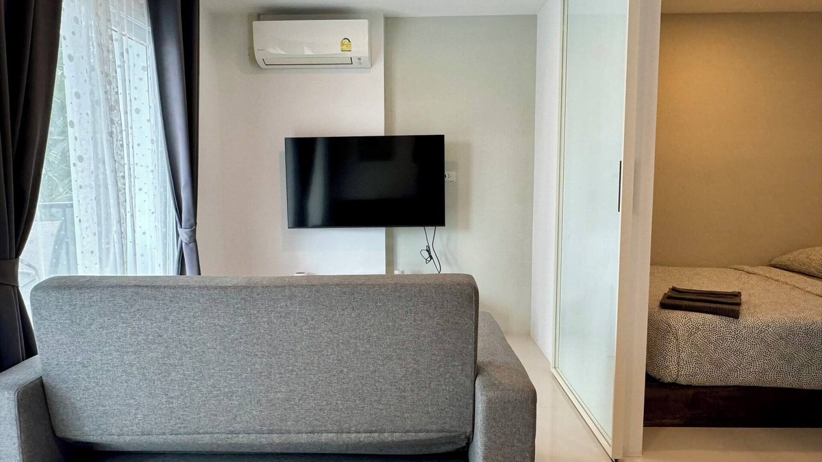 Kram Condo | Beach living 1 bdrm well equiped kitchen, AC, Wi-Fi and Living room
