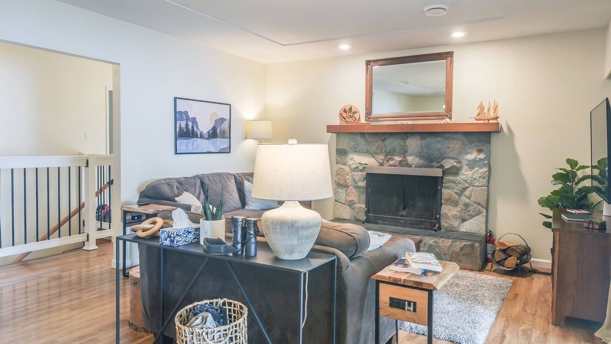 Courtenay House | Beachfront Cottage: Brick Fireplace + Ocean Deck