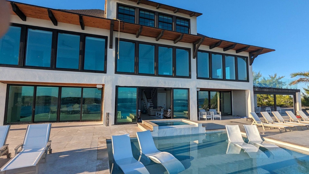 Jimmy Hill House | Beachfront estate home with private 70’ dock and 7500sq ft. of living space