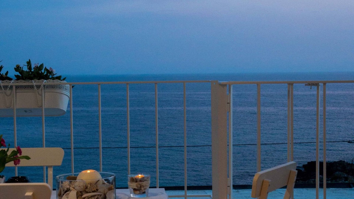 Torre San Giovanni Apartment | Beachfront 2nd floor apartment with terrace located east with sunset