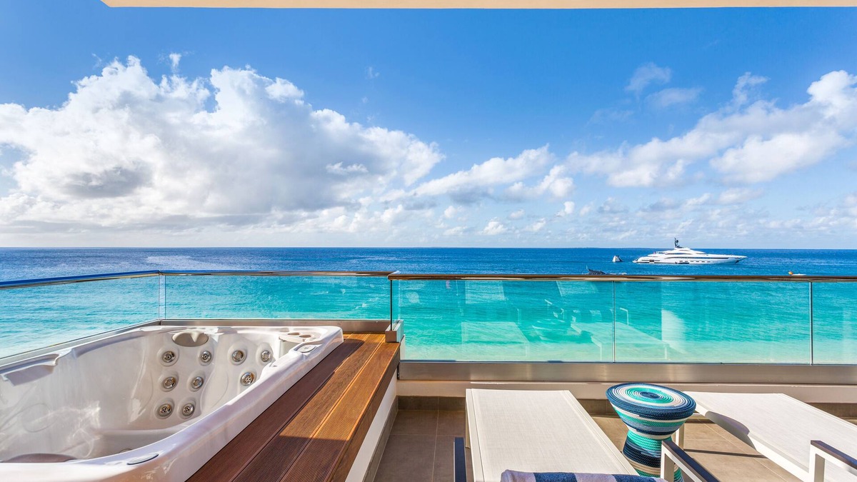 West End Village Villa | BEACHFRONT PENTHOUSE VILLA AT AWARD-WINNING BOUTIQUE RESORT ON MEADS BAY BEACH