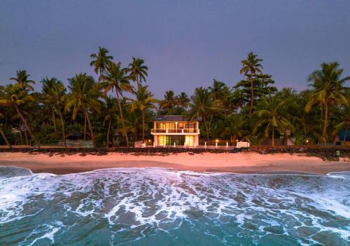 Cherthala House | Beachside Pool Villa - Karthiyayini by VOYE HOMES