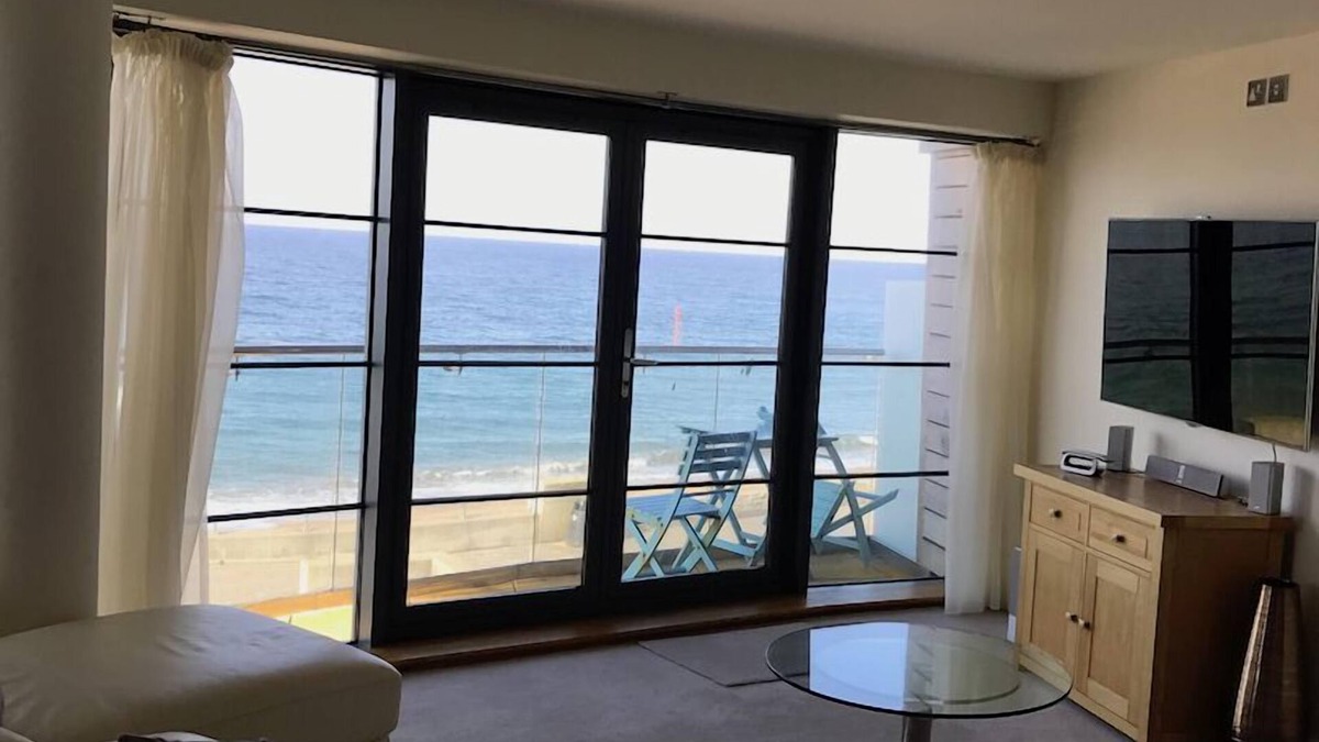 West Bay Apartment | Beachside, stunning apartment with sea and harbour views
