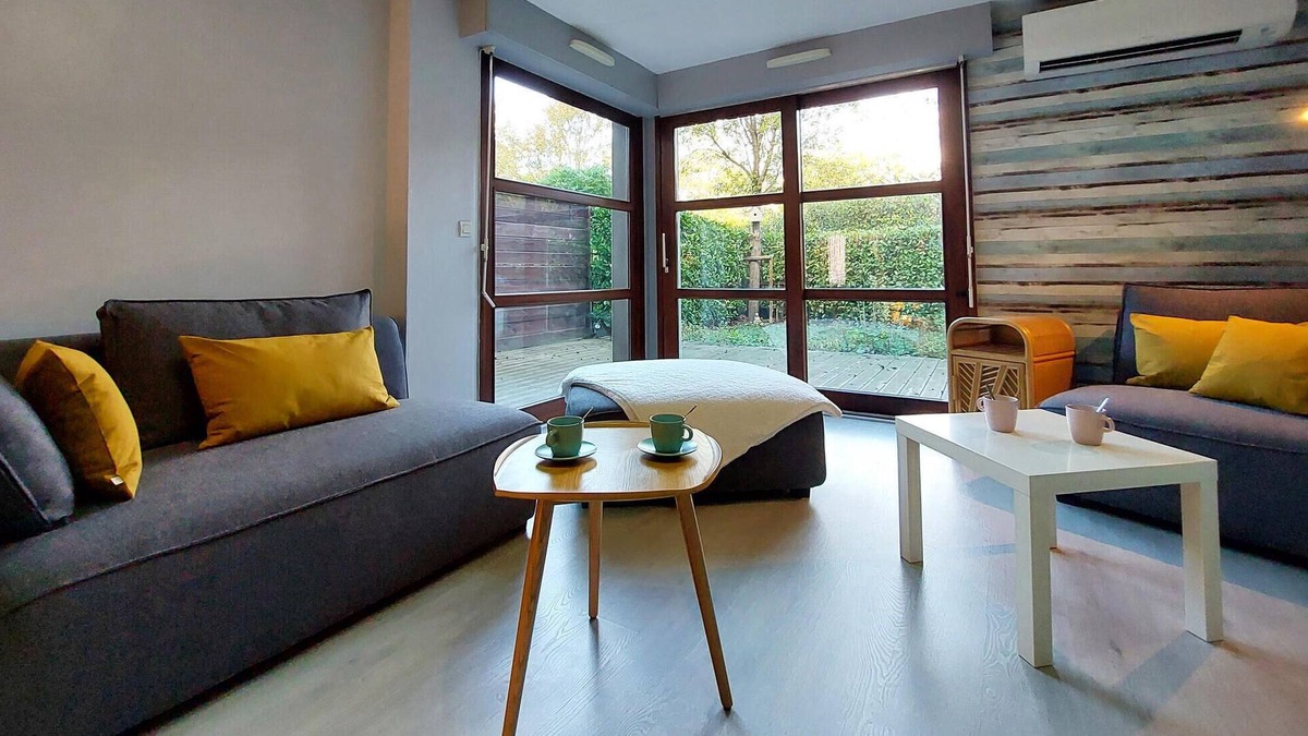 La Grand-Croix Apartment | Beautiful and modern apartment with a large window front.