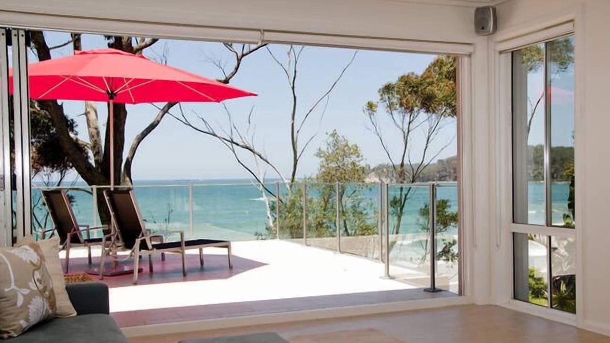 Denhams Beach Apartment | Beautiful and private apartment with large deck on Denhams Beach.