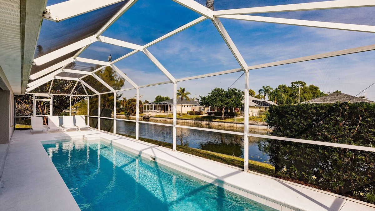 Trafalgar House | Beautiful Cape Coral Home, Outdoor Oasis with Heated Pool on a Freshwater Canal!