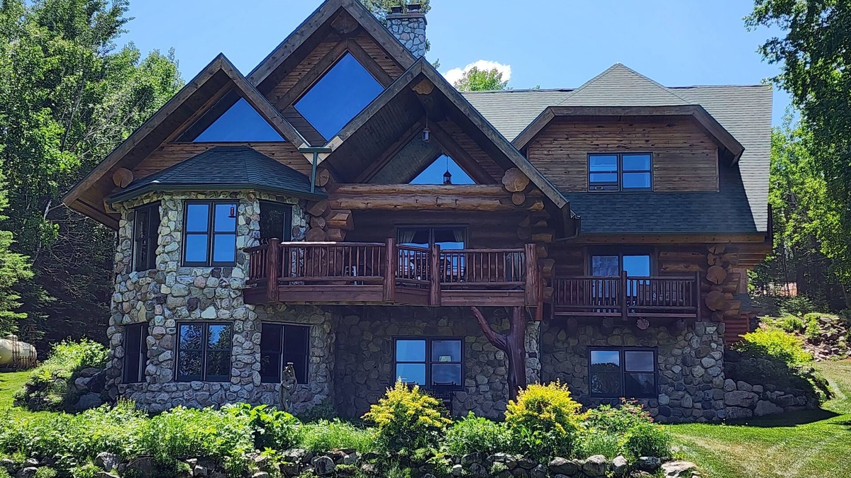 Tower House | Beautiful handmade log home on private sand beach at the end of Big Bay