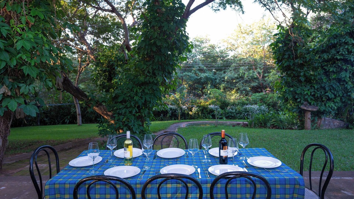 Victoria Falls House | Beautiful home, lush garden, and pool. Walking distance to town and waterfall.