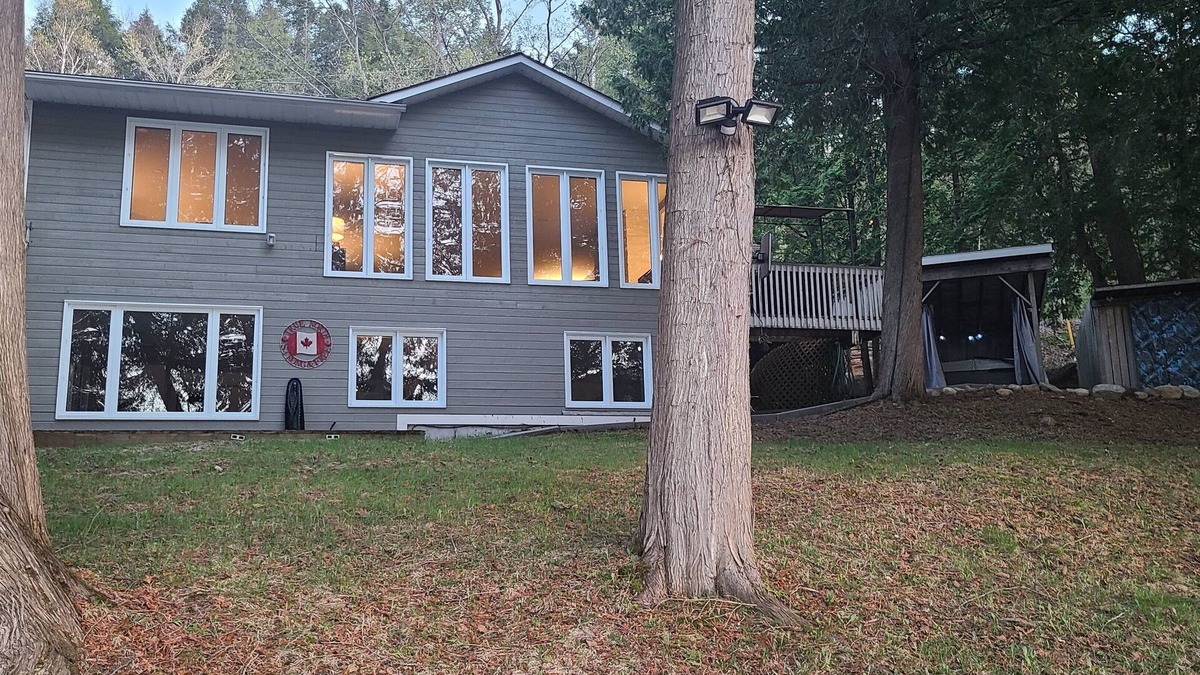 Feronia House | Beautiful home on Trout Lake with hot tub and movie room