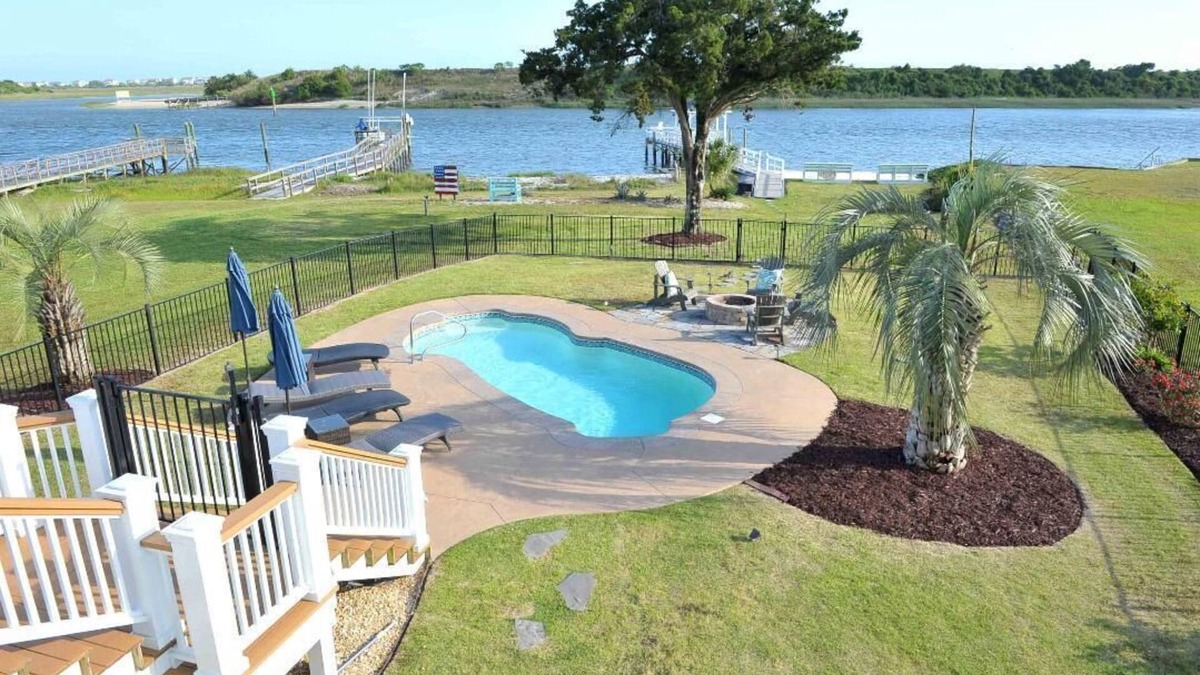 Shallotte House | Beautiful ICW views! Private pier, pool, hot tub, fire pits, and more!